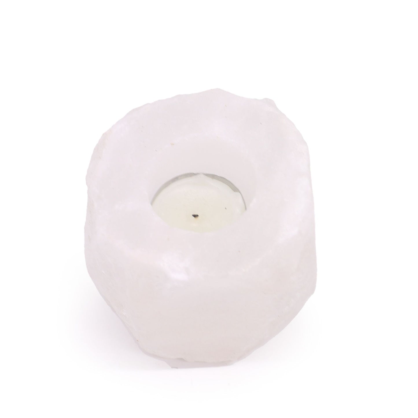 Crystal Rock Himalayan Salt Candle Holder in warm, low candlelight